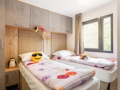 camping-santa-marina-bedroom-of-luxury-mobile-home