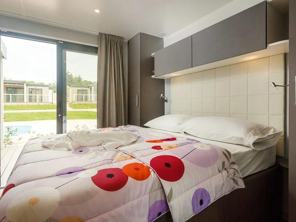 camping-santa-marina-bedroom-of-premium-family-mobile-home-iv