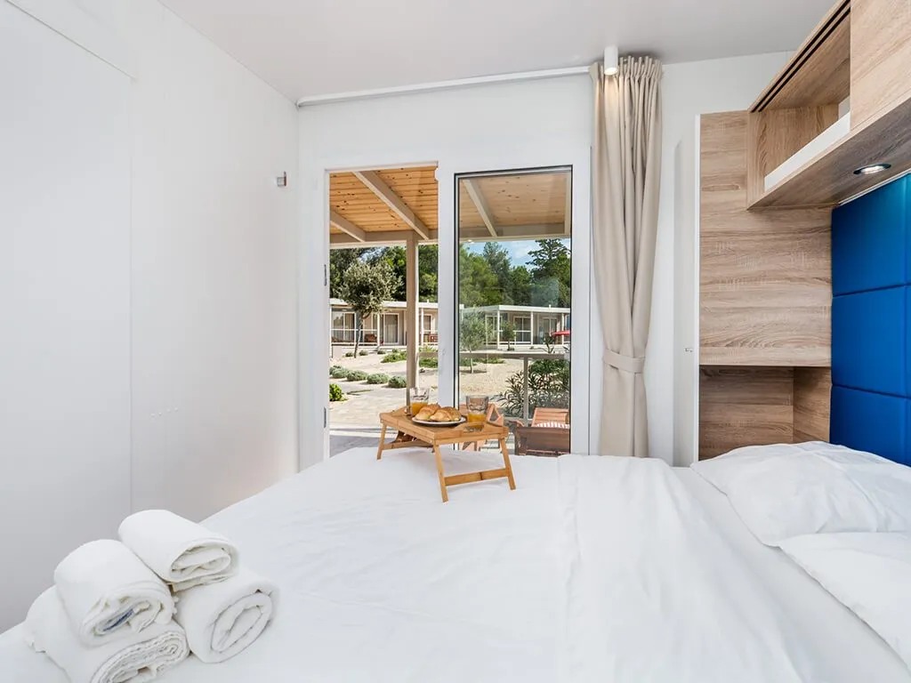 camping-strasko-bedroom-of-mediteran-superior-mobile-home-vii