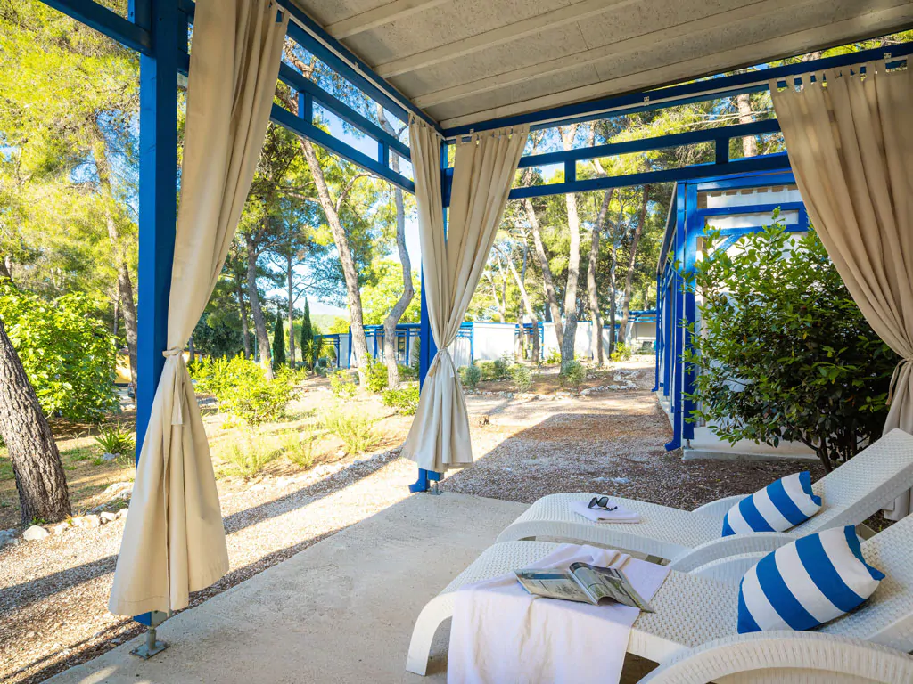 aminess-planet-camping-port9-resort-marko-polo-holiday-home-exterior-terrace-sunbeds-view