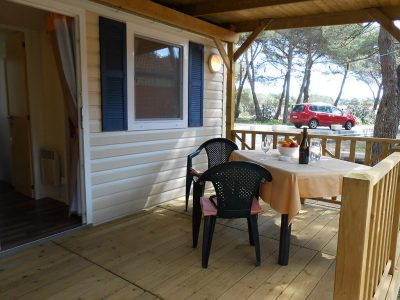 camping-kozarica-mobile-home-couple-terrace-2
