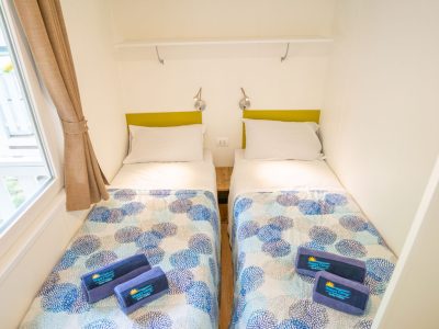 valamar-camping-lanterna-mobile-home-happy-superior-area-j-interior-bedroom-single-beds-view