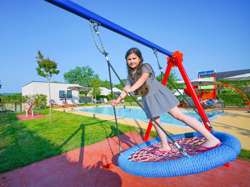 san-servolo-resort-playground-child-girl-swing