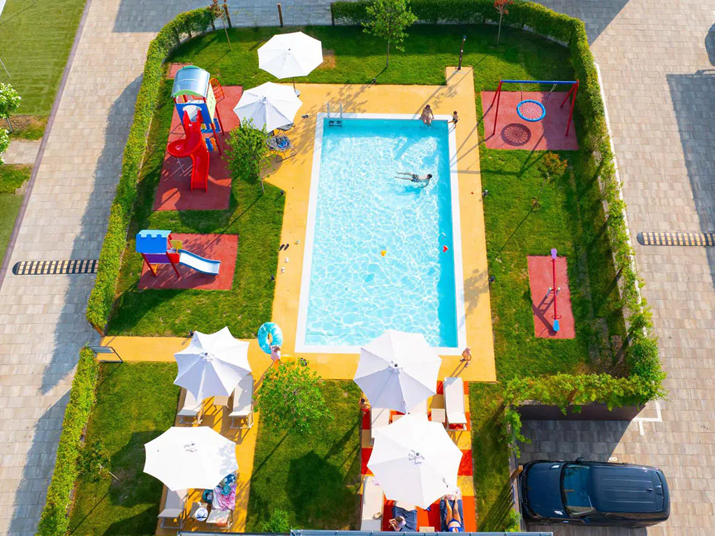 san-servolo-resort-pool-people-air-view