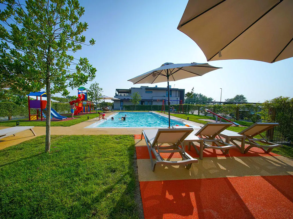 san-servolo-resort-pool-residence-playground-view