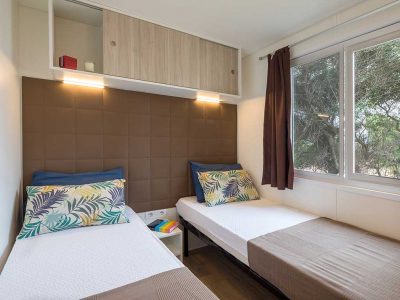 camping-isuledda-mobile-homes-baia-sardinia-bedroom