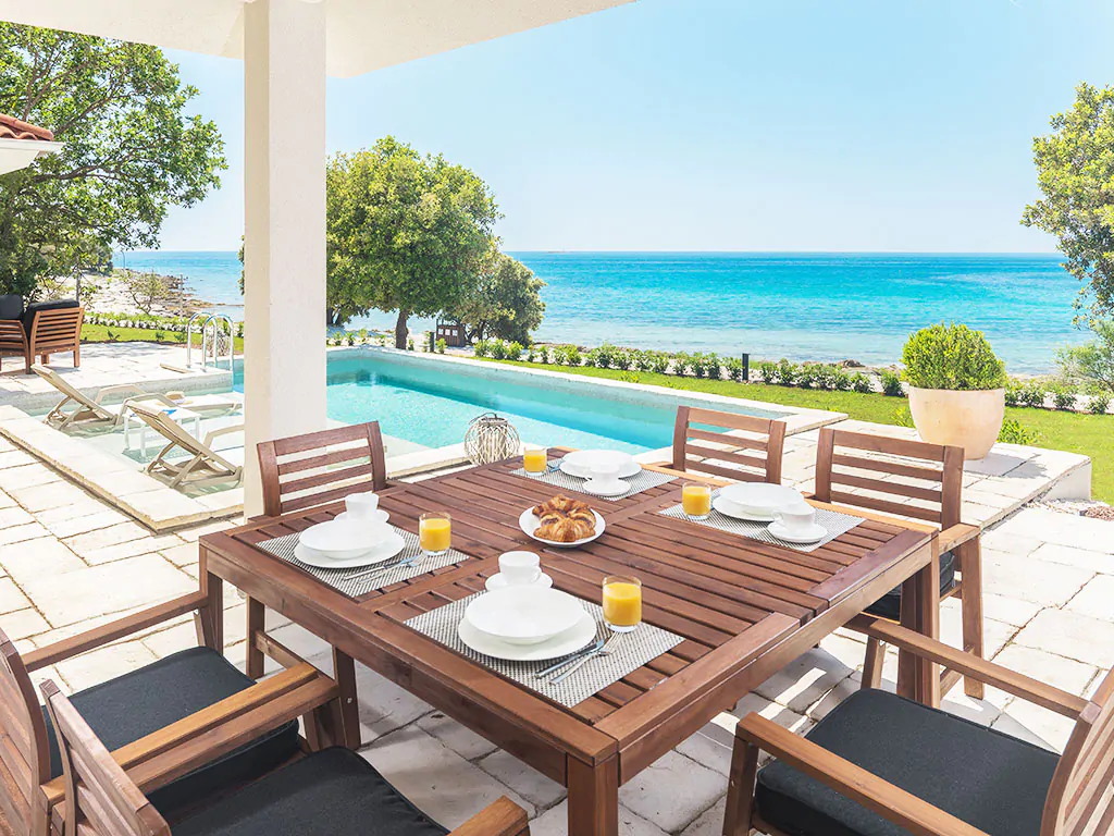 camping-mon-perin-beach-front-villa-porto-bus-exterior-pool-sea-view-breakfast-terrace