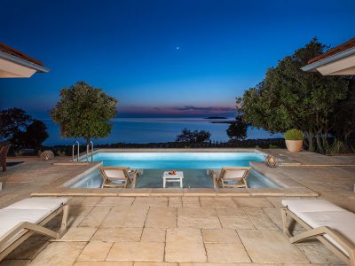 camping-mon-perin-beach-front-villa-porto-bus-exterior-sunset-night-view-pool