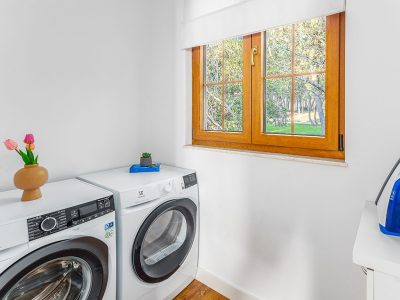 camping-mon-perin-beach-front-villa-porto-bus-interior-laundry-dryer-machine-laundry-room-2