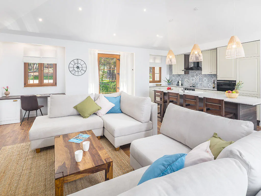 camping-mon-perin-beach-front-villa-porto-bus-interior-living-room-kitchen-2