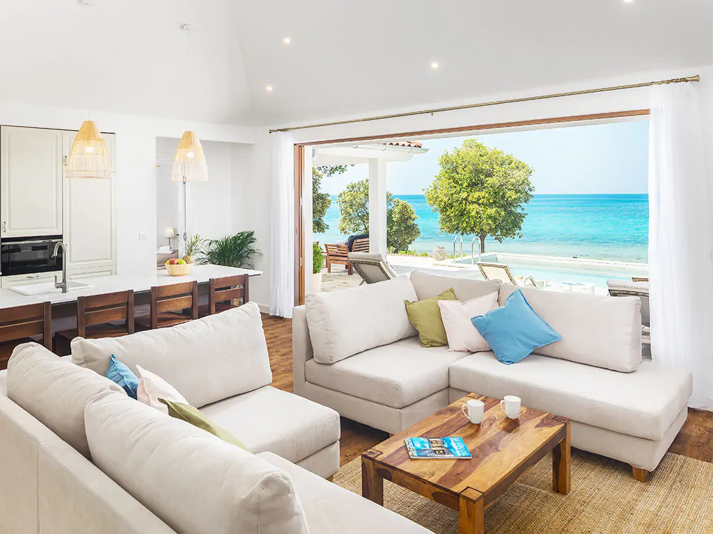 camping-mon-perin-beach-front-villa-porto-bus-interior-sea-view-pool-living-room