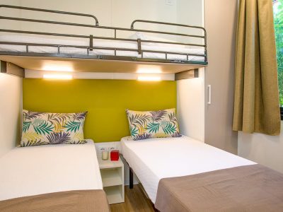 camping-village-piccola-gardiola-mobile-home-baia-new-project-bedroom