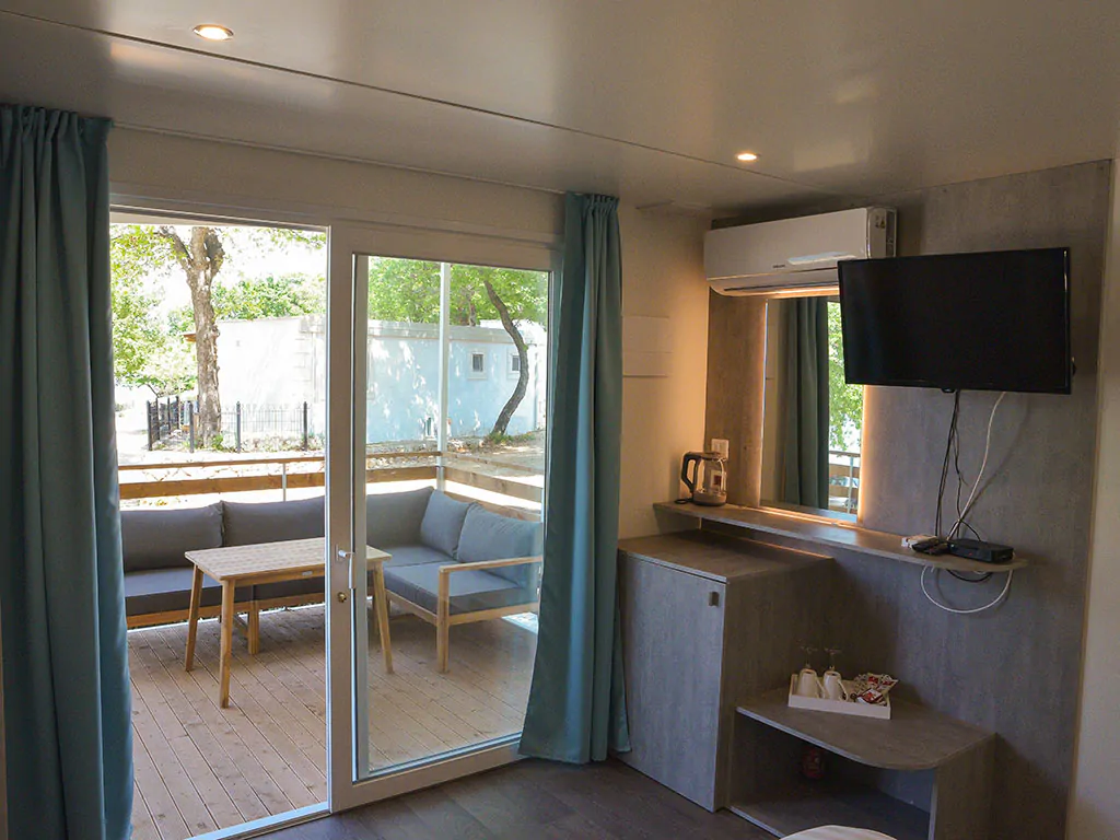 camping-glavotok-mobile-home-romantic-room-interior-bedroom-air-conditoner-terrace