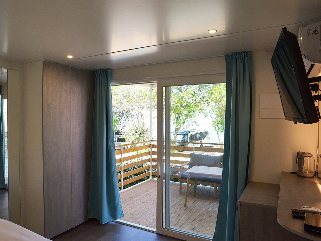 camping-glavotok-mobile-home-romantic-room-interior-bedroom-terrace-sea-view
