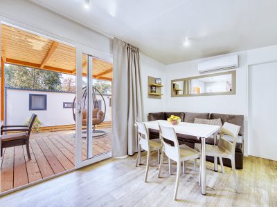 camping-park-soline-family-de-lux-interior-dining-table-terrace-view-2