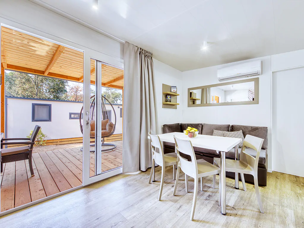 camping-park-soline-family-de-lux-interior-dining-table-terrace-view-2