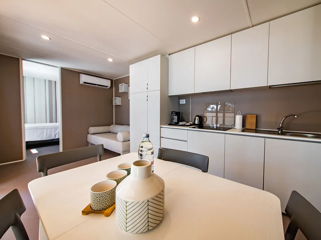 camping-arena-stoja-camping-villa-interior-kitchen-dining-table