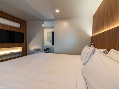 camping-stoja-deluxe-camping-villa-interior-bedroom-details-double-bed