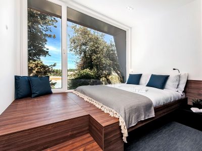 porton-biondi-nature-hideouts-mobile-homes-family-double-bed-seaview