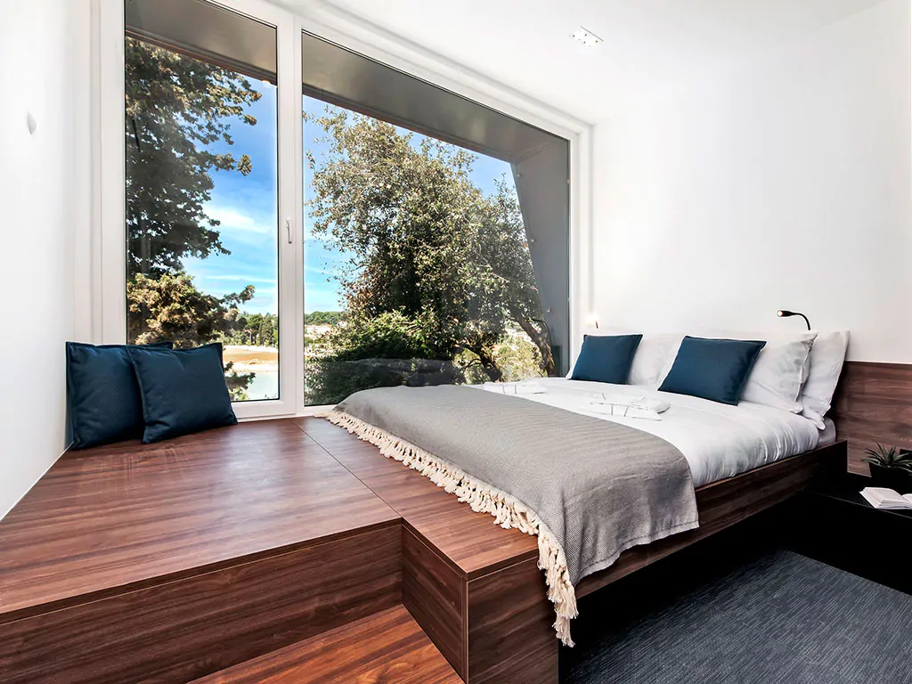 porton-biondi-nature-hideouts-mobile-homes-family-double-bed-seaview