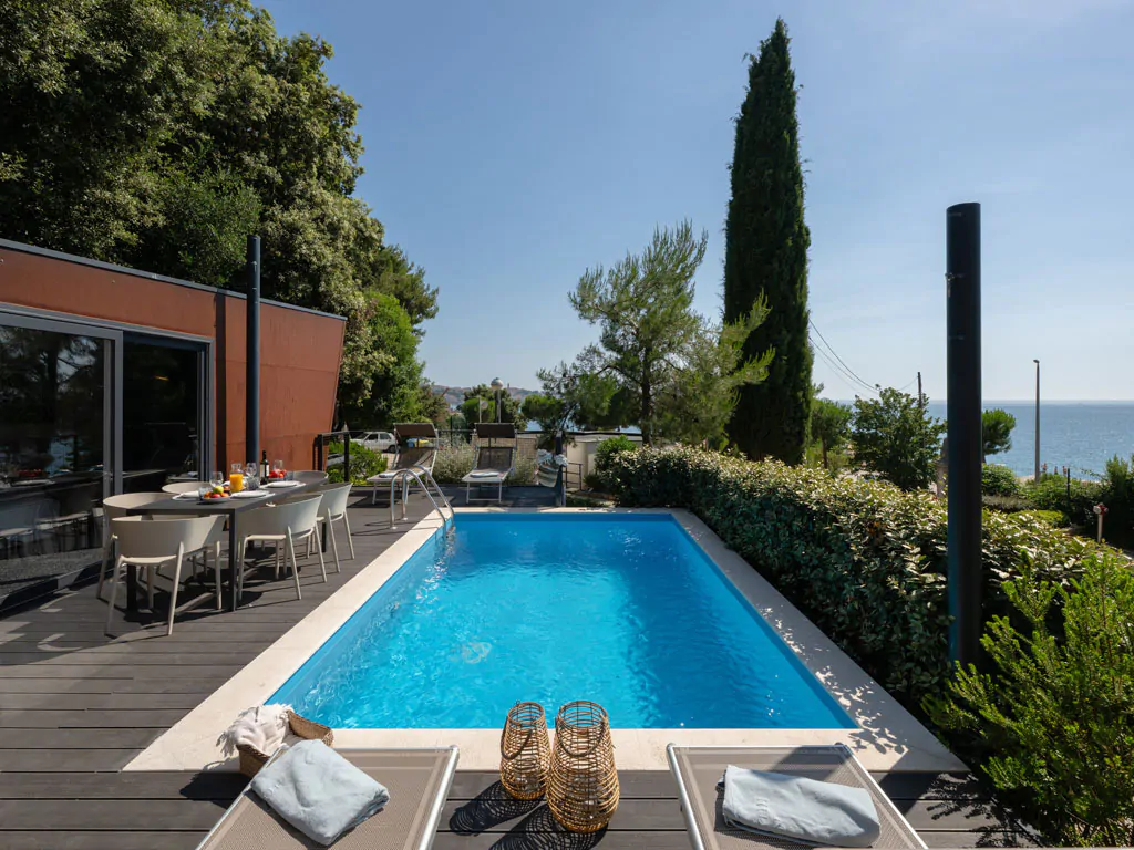 porton-nature-hideouts-mobilehome-porton-holiday-home-pool-two-modules-exterior-pool-terrace