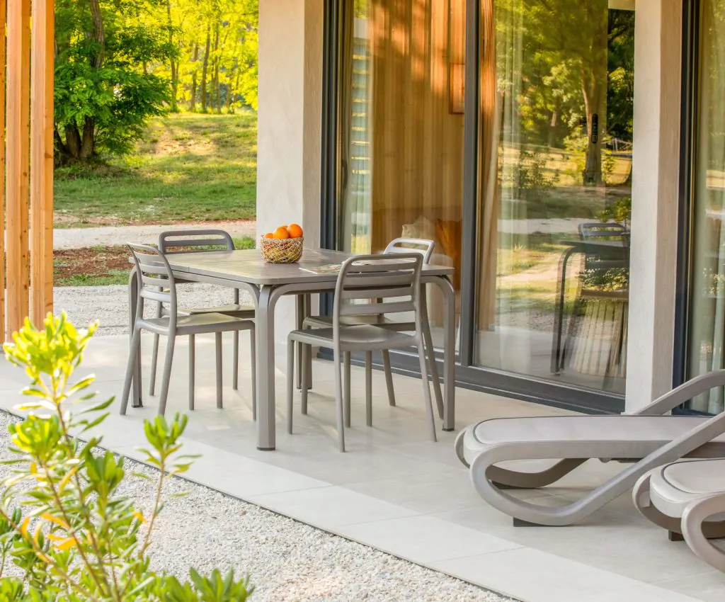 solaris-naturist-camping-exterior-terrace-sun-beds-scaled