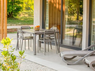 solaris-naturist-camping-exterior-terrace-sun-beds-scaled