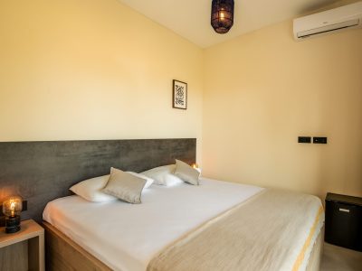 solaris-naturist-camping-mobile-home-plus-premium-interior-bedroom-double-bed-scaled