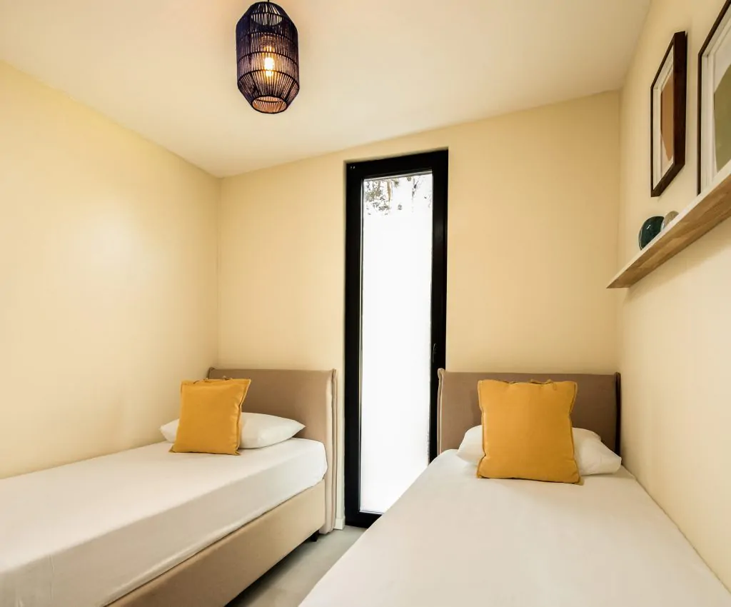 solaris-naturist-camping-mobile-home-plus-premium-interior-bedroom-single-beds-scaled