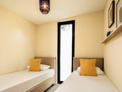 solaris-naturist-camping-mobile-home-plus-premium-interior-bedroom-single-beds-scaled