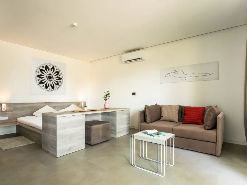 solaris-naturist-camping-resort-mobile-home-premium-living-room-with-double-bed-i-scaled