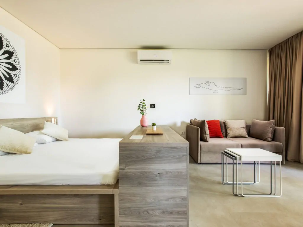 solaris-naturist-camping-resort-mobile-home-premium-living-room-with-double-bed-scaled