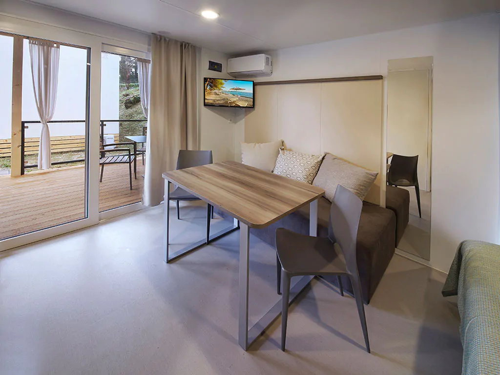 campsite-adria-ankaran-mobile-home-premium-terrace-interior-living-room