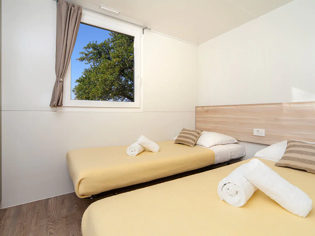 camping-paklenica-bluesun-interior-of-double-bed-bedroom-of-mobile-homes-for-6-plus-i