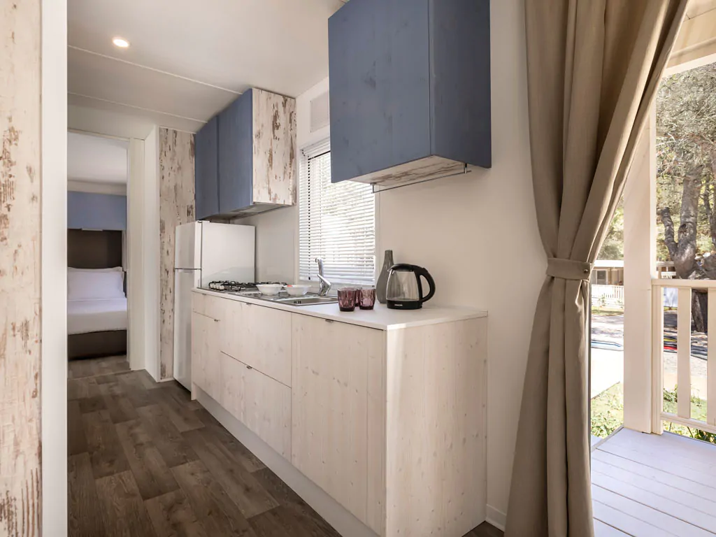 campsite-valkanela-mobile-home-forest-escape-family-interior-kitchen-view