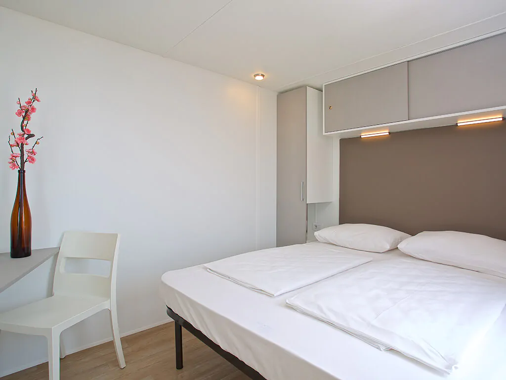 campsite-cikat-mobile-home-type-c-interior-bedroom-double-bed