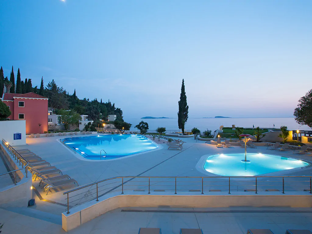 villas-mlini-resort-outdoor-pool-by-night