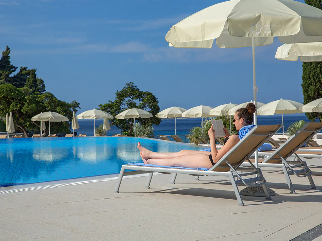 villas-mlini-resort-outdoor-pool-sunbeds