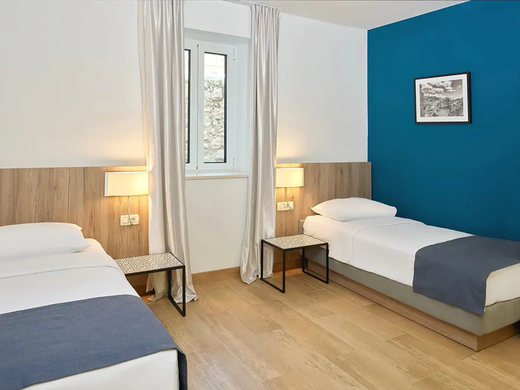 villas-srebreno-resort-standard-apartment-for-6-interior-bedroom-single-beds