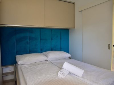 camping-glavotok-premium-bungalow-interior-bedroom-double-bed
