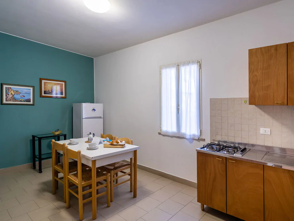 stork-family-camping-village-bungalow-comfort-bilocale-interior-living-room
