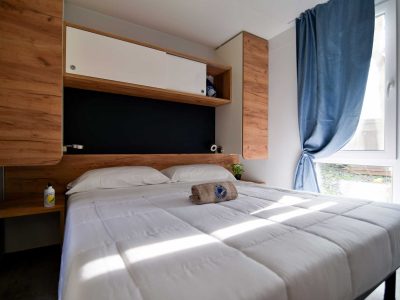 la-risacca-family-collection-lodge-deluxe-family-interior-bedroom-double-bed