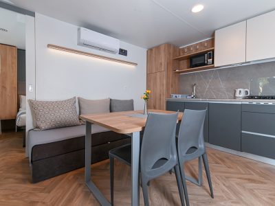 camping-morenia-beach-resort-mobile-home-interior-living-room-dining-table-2