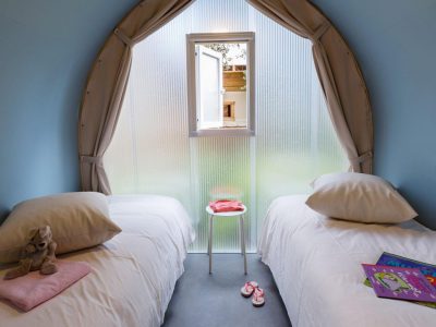 weekend-glamping-resort-coco-suite-interior-bedroom-single-beds