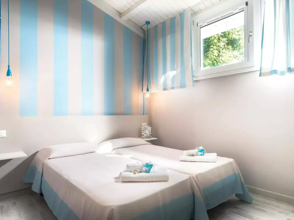 apartment-superior-villaggio-san-francesco-interior-double-bed