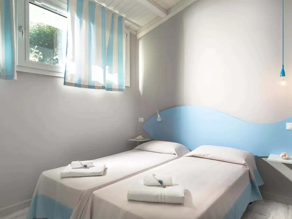 apartment-superior-villaggio-san-francesco-interior-single-beds