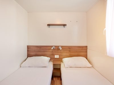 brioni-sunny-camping-interior-bedroom-single-beds