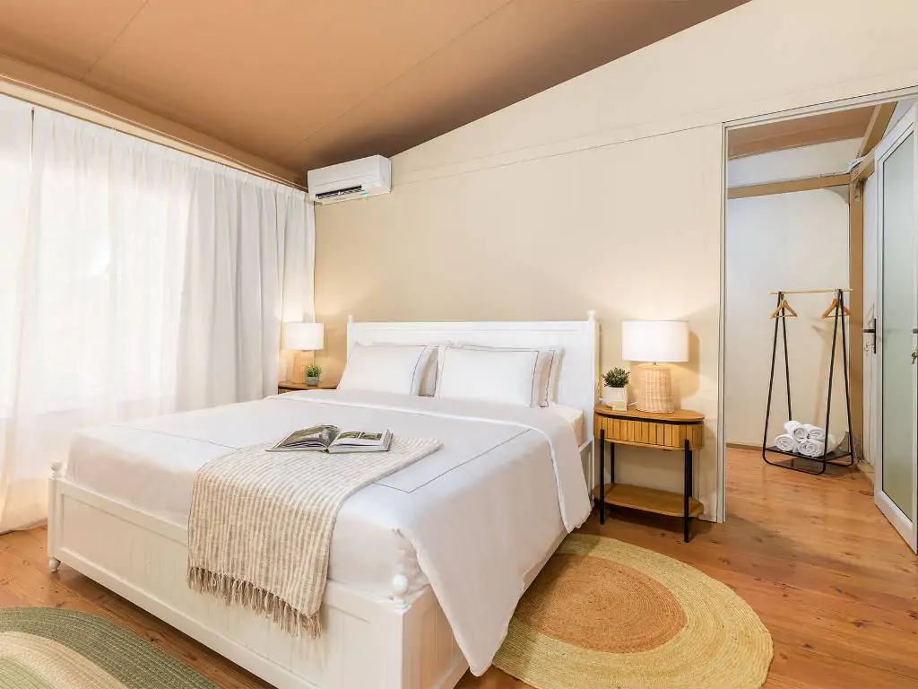 arena-one-99-glamping-grand-escape-luxury-suite-interior-bedroom
