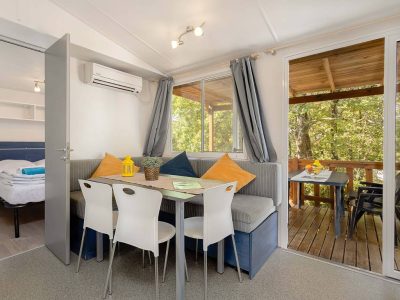 zelena-laguna-mobile-home-capri-interior-living-room-dining-table