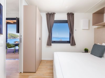 camping-arena-stupice-mobile-home-camping-home-first-row-to-the-sea-interior-bedroom-2